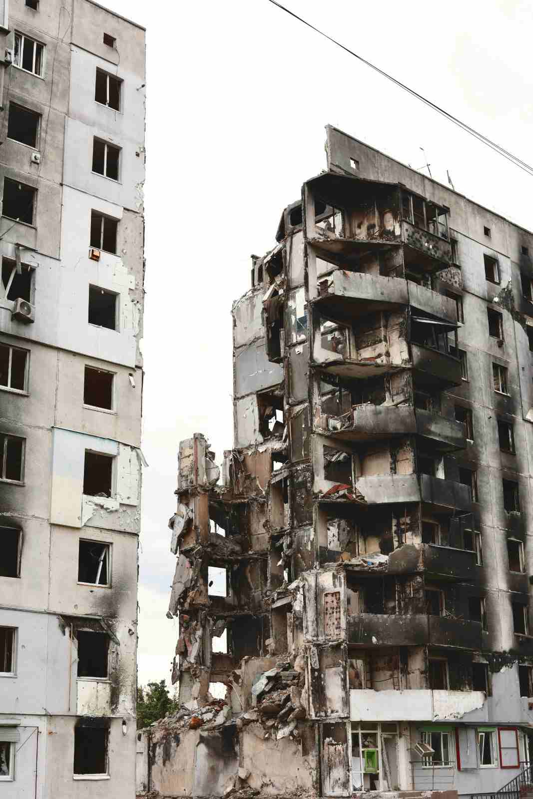 Severe structural fire damage destroying a Laurel high-rise residential apartment building.