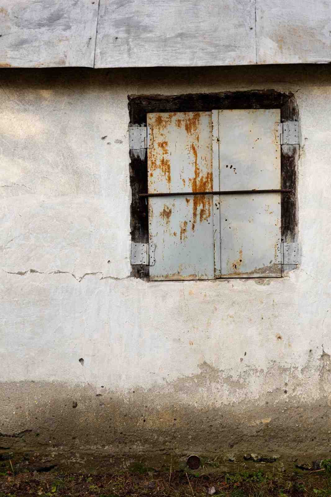 Industrial buildings partially submerged in floodwater.