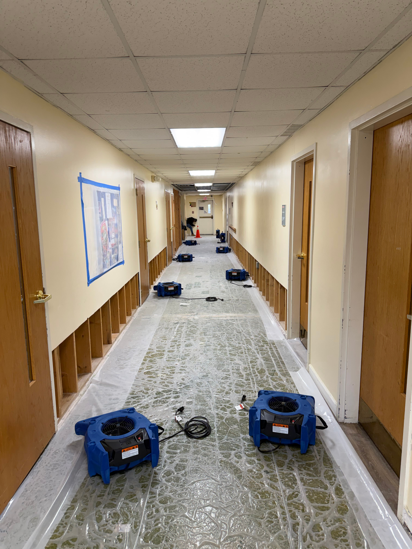Commercial water damage – hallway drying with industrial air movers